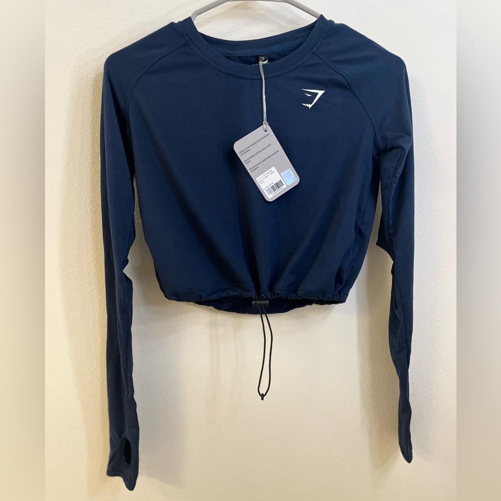 NWT. Size XS. Gymshark drawcord crop. Blue